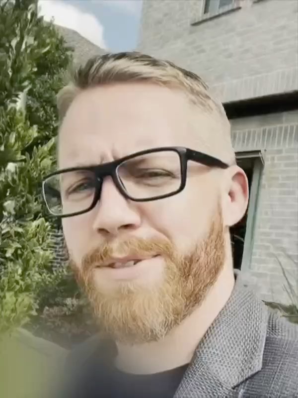 Me outside a new-construction model home, talking to the camera